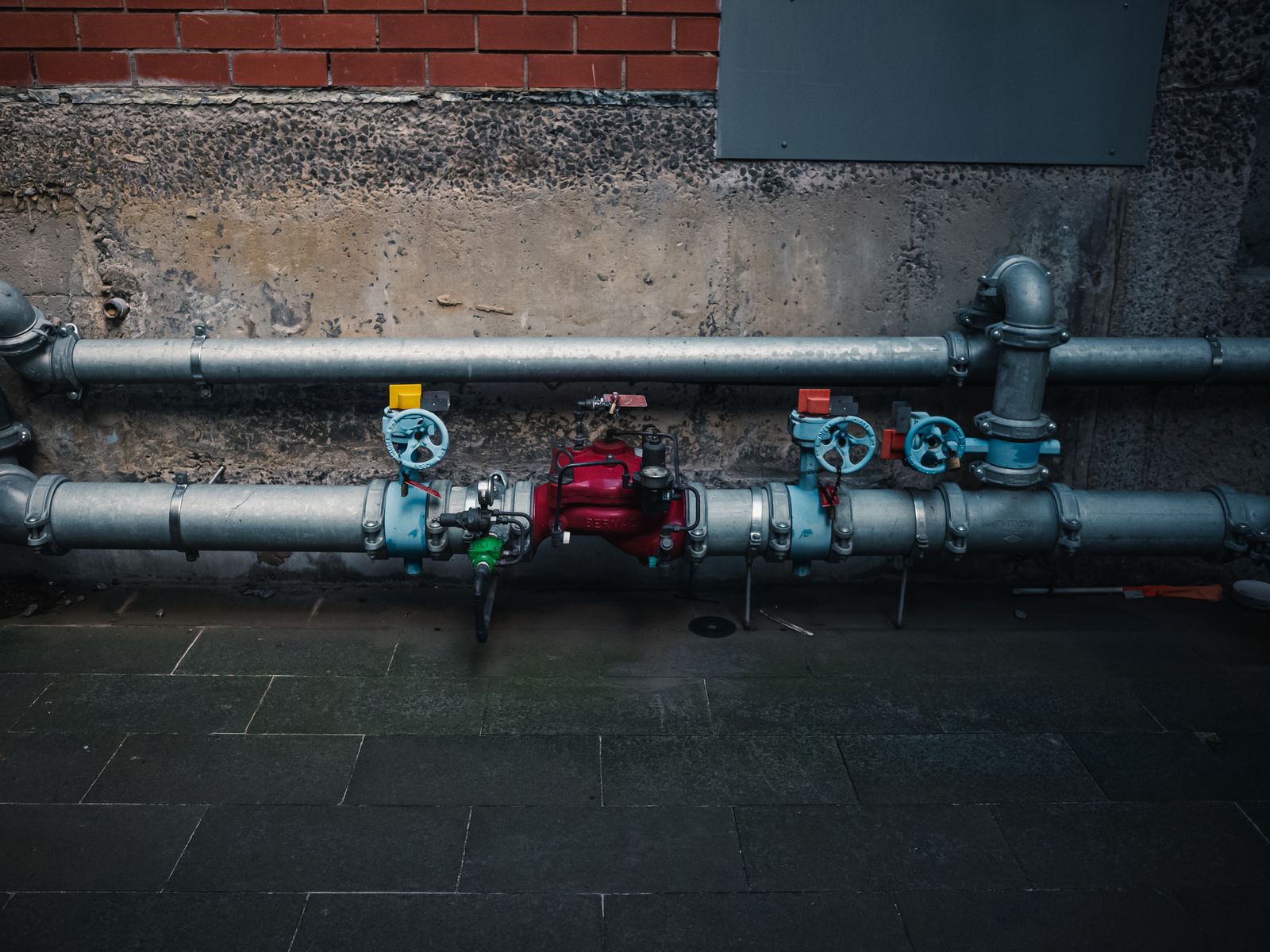 Industrial pipework with valves — the specialised plumbing work that often needs a custom-built tool to manage well